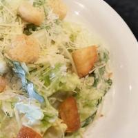 Caesar Salad (Individual) · Crisp Romaine lettuce, shredded Parmesan cheese, garlic Parmesan croutons, and our classic C...