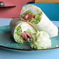 Avocado Ranch Chicken Wrap · Avocado, shredded chicken, cheddar cheese, tomato, lettuce and ranch dressing.