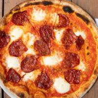 Salamino Picante (Spicy Salami Pizza) · Your choice of pizza crust served with our signature red sauce, mozzarella (Mozzarella Fiord...