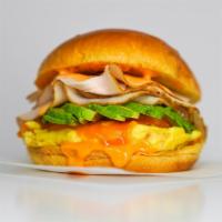 Brioche Smoked Turkey, Egg, And Avocado Sandwich · 2 fresh cracked cage-free scrambled eggs, melted Cheddar cheese, smokey turkey, avocado, and...