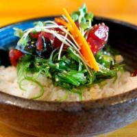 Poke Bowl · Seaweed salad with choice of albacore, salmon, yellowtail or tuna over sushi rice.
