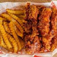 3 Pieces Seoul Spicy Chicken Tenders With Fries · 3 pieces chicken tenders in a Traditional Korean Sweet and Spicy sauce with fries and Comeba...