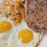 Steak & Eggs (2) · Juicy marinated New York steak served with two eggs.