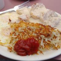Eggs Biscuits And Gravy · 2 eggs, biscuits, and homemade gravy served with hash browns.
