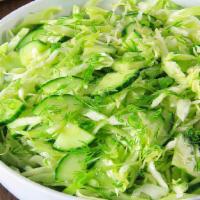 Fresh Cabbage Salad · Refreshing Cabbage Cucumber & carrot Salad  made with olive oil and vinegar
