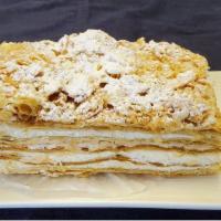 Slice Of Cake Napoleon · Large Slice. Buttery, flaky and creamy. Layers of buttery pastry, a creamy vanilla custard a...