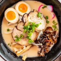 Tonkotsu Ramen · Favorite. Roasted pork chashu, boiled egg, kikurage mushroom bamboo shoots, green onions, sp...