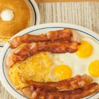 Bacon & Eggs · 4 strips of bacon, three eggs, hash browns & 3 pancakes.