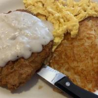 Country Fried Steak · Battered beef steak with our rich country gravy served with mashed potatoes & corn.