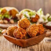 Falafels (3) · Crispy garbanzo beans marinated in homemade spices.