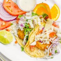 Fish Taco · Tortillas, pico de gallo, and cabbage.