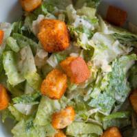 Classic Caesar · Baby organic romaine hearts, cheese croutons, shaved parmesan.