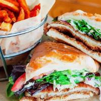 Crispy Chicken Sandwich · Brioche bread, mixed greens, sweet and spicy mustard, mozzarella cheese, red onions, tomato,...