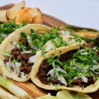 Asada Taco · Most popular. Beef meat, onions, cilantro radishes, and salsa red or green.