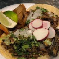 Tacos De Tripas · beef grill tripas with cilantro salsa and onions.