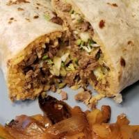 Asada Burrito · Most popular. Beef, rice, beans, onion, cabbage and cilantro.