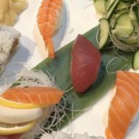 Slab Sashimi Plate · Come with house salad. Chef's choice of 12 pieces of assorted sashimi.