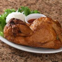 Golden Chicken · Marinated and seasoned crispy fried chicken served with our own sweet chili sauce.  Serves o...