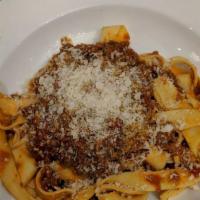 Spaghetti Checca · Chopped tomatoes, garlic, basil, extra virgin olive oil and fresh mozzarella.