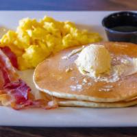 Double Eagle · Two eggs, two pancakes, and choice of bacon or sausage.