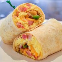 Classic Breakfast Burrito · Warm flour tortilla stuffed with your choice of ham, bacon, sausage, or chorizo., bell peppe...
