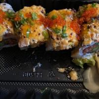 Thunder · Torched salmon and crab meat mix, cucumber, deep fried asparagus, spicy tuna, and sauce.