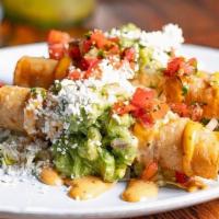 Taquitos Deliciosos · 3 crispy hand-rolled tortillas with chicken, mushroom, corn, queso fresco