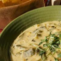Chicken Tortilla Soup. · our classic recipe with shredded chicken, cilantro, and crunchy tortilla strips