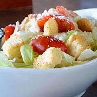 House Salad · Blue cheese or ranch dressing, spring mix lettuce, heirloom tomatoes, parmesan, croutons