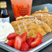 Bruxie Waffle · Maple syrup, or berries & whipped cream.