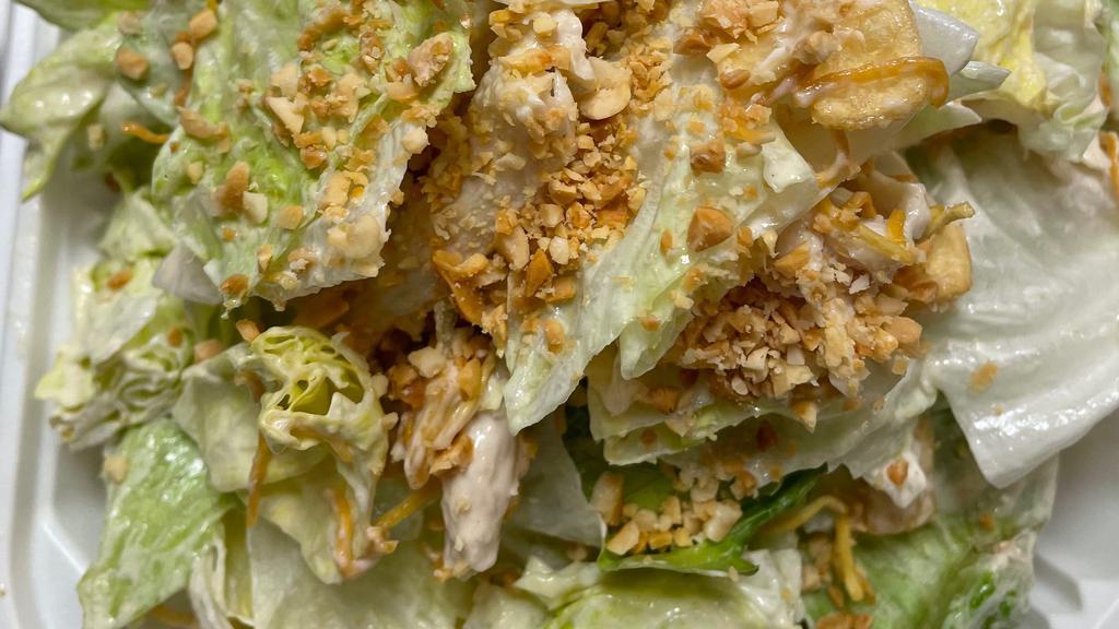  Chinese Chicken Salad · lettuce, carrots, crispy noodles, wontons, and peanuts in our miso dressing.
topped with sesame seeds