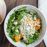 Arugula Orange Salad · Arugula tossed in fig-tangerine dressing topped with gorgonzola cheese, candied walnuts and ...