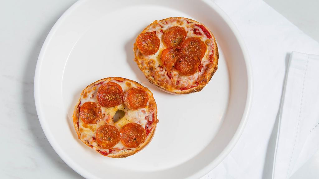 Pepperoni Pizza · Pepperoni, pizza sauce, and mozzarella.