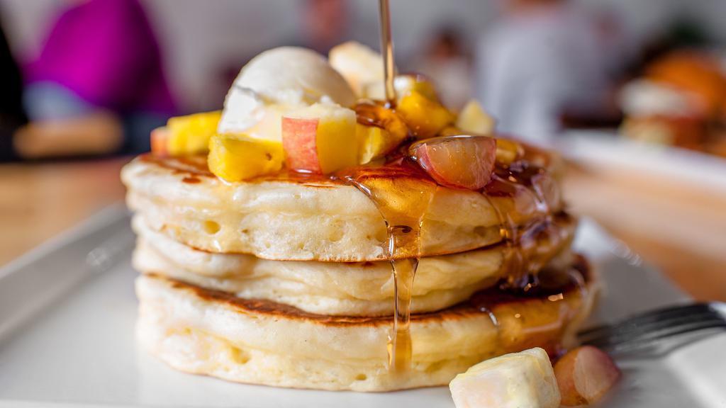 Flapjacks · our buttermilk batter. warm syrup.  diced fruit. whipped butter.