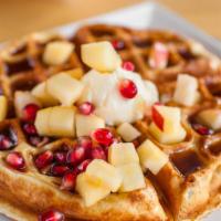 Waffle · buttermilk batter waffle.  diced fruit.   whipped butter. warm syrup on the side.