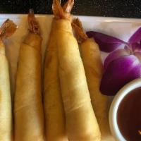 Shrimp In Blanket (5 Pcs) · Shrimp wrapped in spring roll pastry deep fried serve with sweet and sour sauce