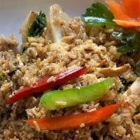 Spicy Fried Rice · Jasmine rice, Garlic, Onion, Egg, Bell pepper, Thai Basil.