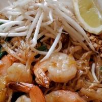 Pad Thai · Thin rice noodles, Egg, bean sprouts, Green onion, Crunched peanuts.