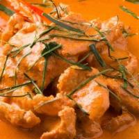 Panang Curry · Curry paste, coconut milk, bell peppers, top of Kaffir lime leaves.