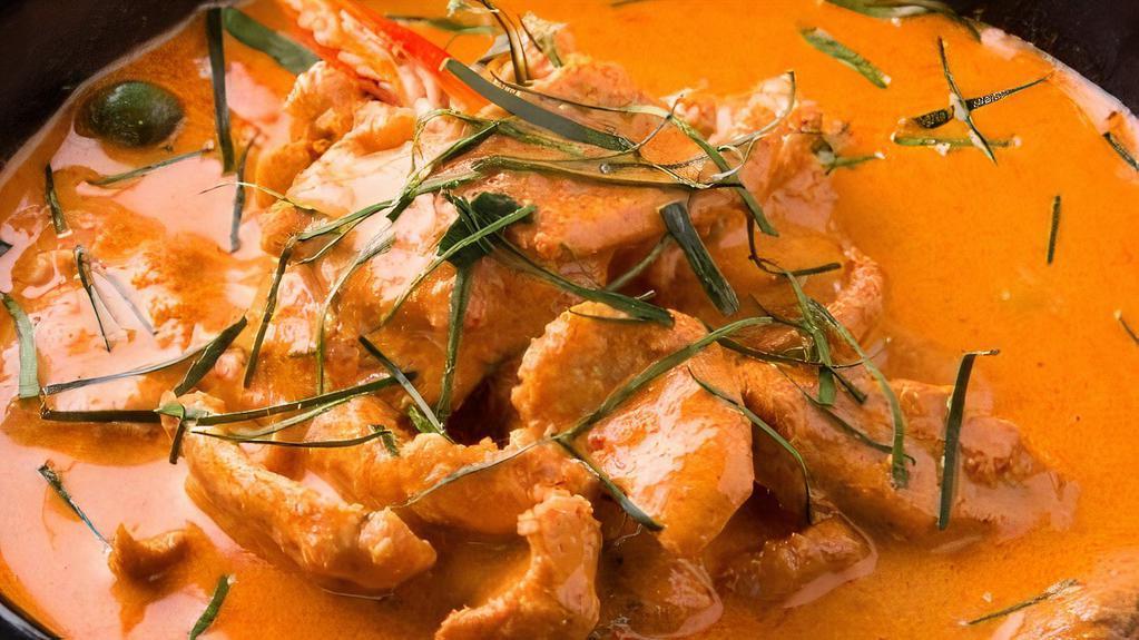 Panang Curry · Curry paste, coconut milk, bell peppers, top of Kaffir lime leaves.