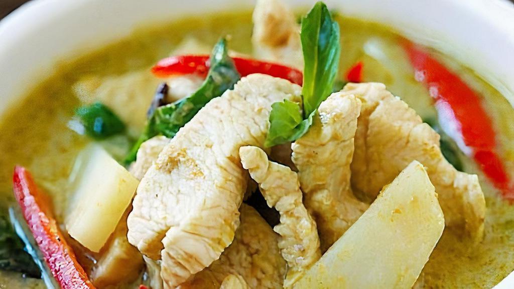 Green Curry · Curry paste, coconut milk, bamboo shoots,
bell peppers, eggplant, Thai basil.