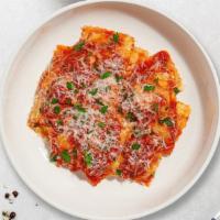 Meat Madness Ravioli · A delicious, filling, and savory pasta. Fresh ravioli filled with minced meat cooked with cr...