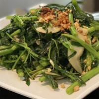 Stir-Fry Conch With Water Spinach (Oc Giac Xao Ray Muong) · 