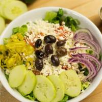 Greek Salad · Romaine, Feta, Cucumber, Kalamata Olives, Tomatoes, Pepperoncinis & Red Onions