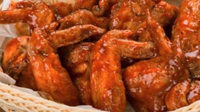 Buffalo Wings · Fried wings smothered in our own spicy buffalo sauce. Served with ranch dressing and celery sticks.