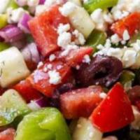 Greek Salad · Fresh lettuce tossed with tomatoes, cucumbers, artichoke hearts and olives. Topped with Feta...