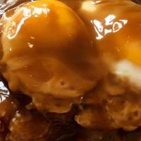 Loco Moco · An island favorite! Two seasoned hamburger patties, two eggs on a bed of white rice, smother...