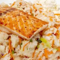 Grilled Salmon W/ Vegetable Fried Rice · Fillet seasoned with lemon pepper, served on a bed of vegetable fried rice served with macar...