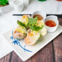 Spring Rolls · Two per order. Thin rice noodles, pork, shrimp, bean sprouts, and lettuce wrapped in rice pa...