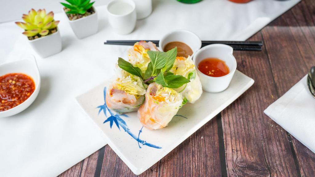 Spring Rolls · Two per order. Thin rice noodles, pork, shrimp, bean sprouts, and lettuce wrapped in rice paper, served with peanut sauce and shanghai sauce.